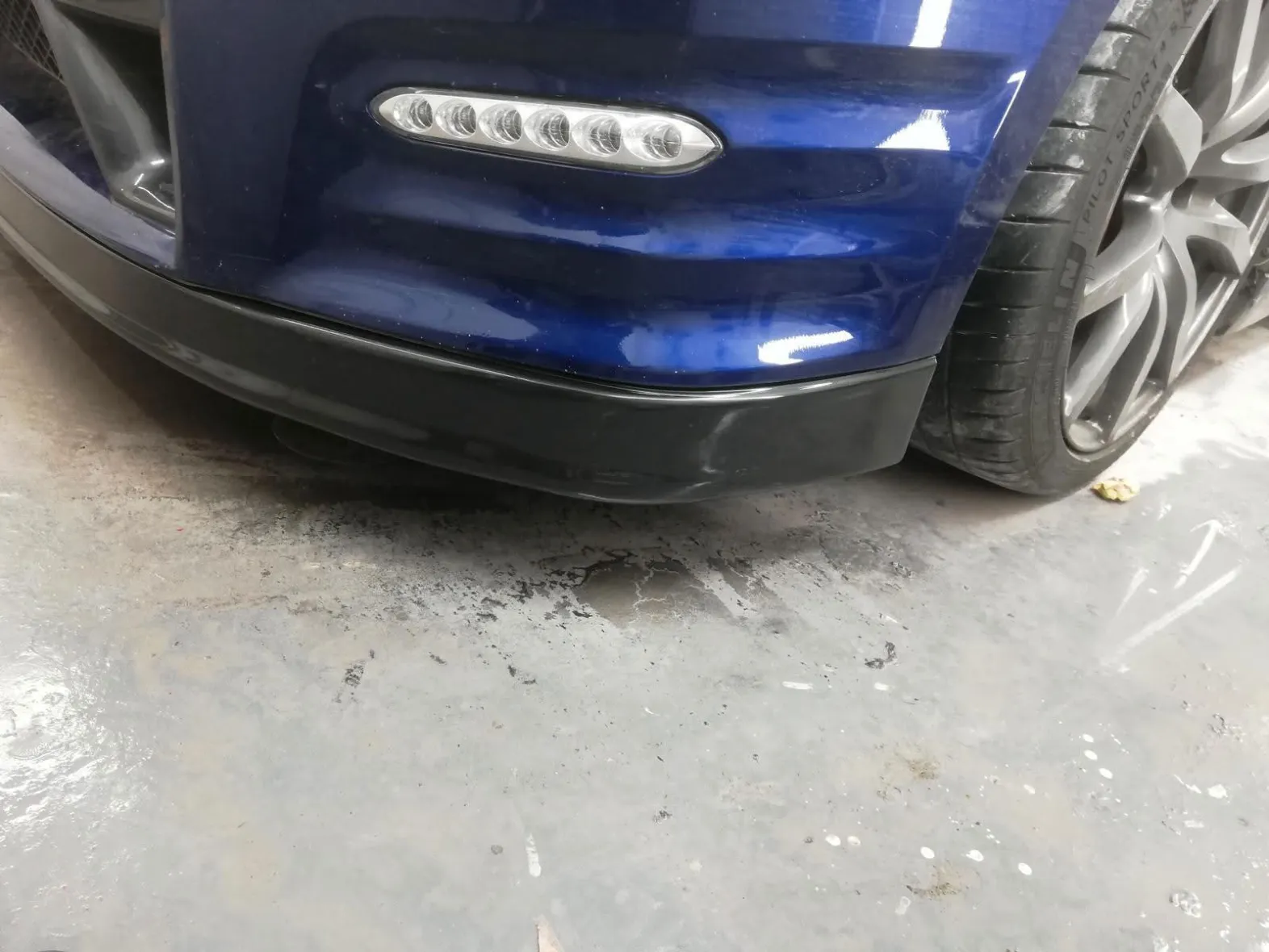Car bumper after repair, colour matched and polished